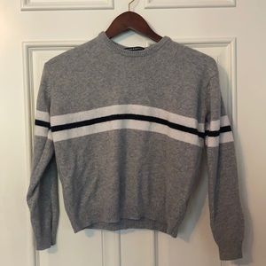 Grey sweater with stripe.